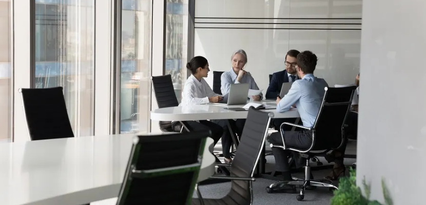 Lawyers' meeting in conference room.